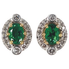 18ct Yellow Gold Emerald 
Diamond Studs