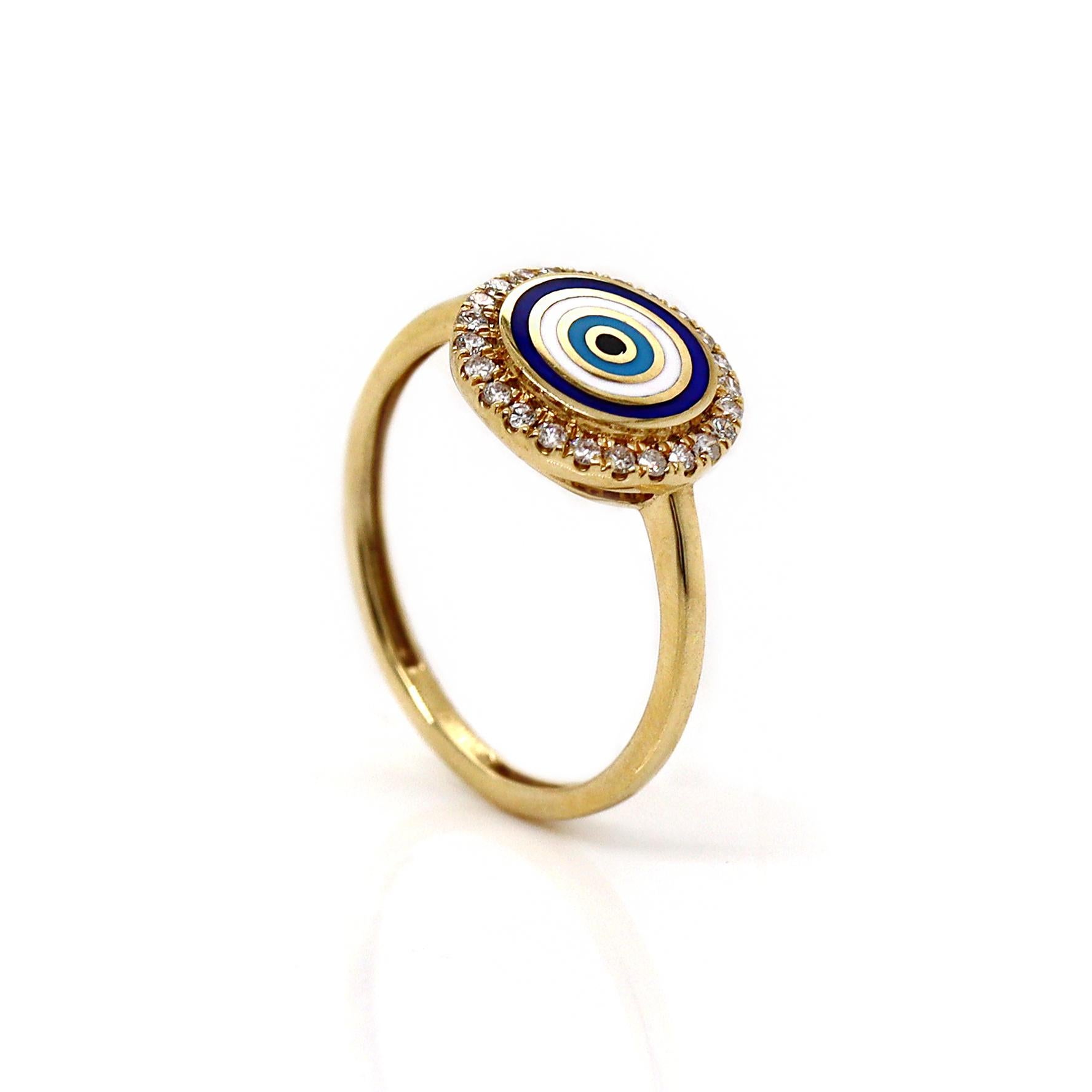 18ct Yellow Gold Evil Eye Diamond Ring

This striking 18ct gold ring features an iconic evil eye design, beautifully crafted with white and blue enamel to create a vivid, eye-catching centerpiece. The central eye is surrounded by a halo of sparkling
