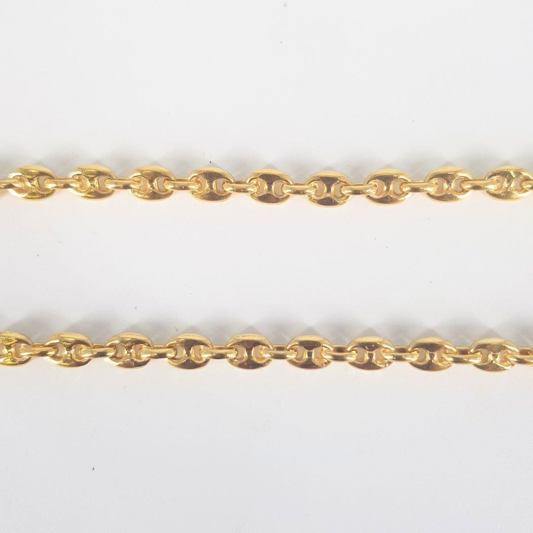 Magnificent 
Chain Attributes: 
Weight:			49gram 
Metal Colour:		Yellow gold 
Metal:			18ct 
Chain measurements:
Length:                           	720mm
Width: 			5mm
