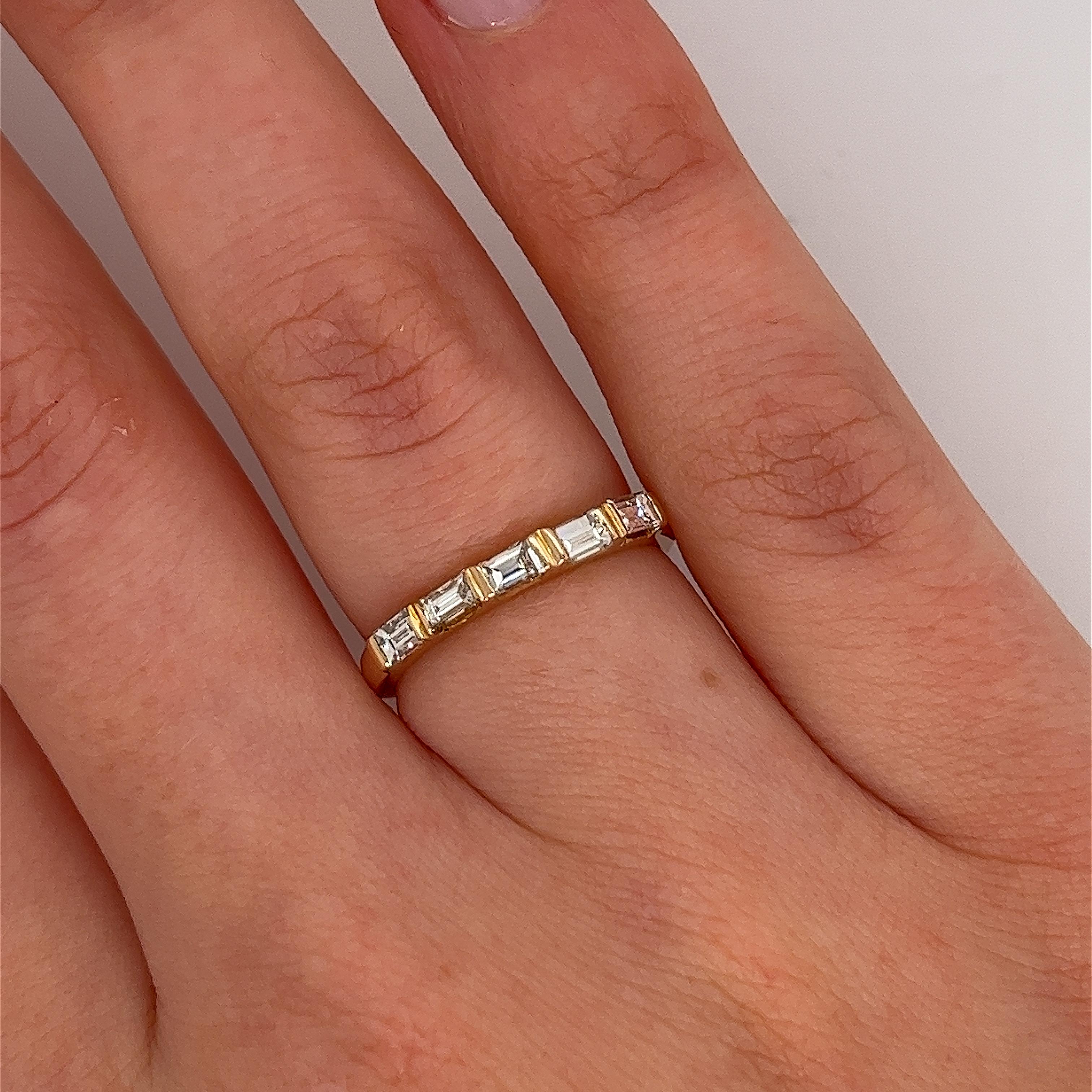 A beautiful diamond half-eternity ring, 
is set with 0.48 carats G/H colour SI1 clarity baguette diamonds.
This stunning symbol of everlasting love.

Total Diamond Weight: 0.48ct 
Diamond Colour: G/H
Diamond Clarity: SI1
Width of Band: 1.73mm
Length
