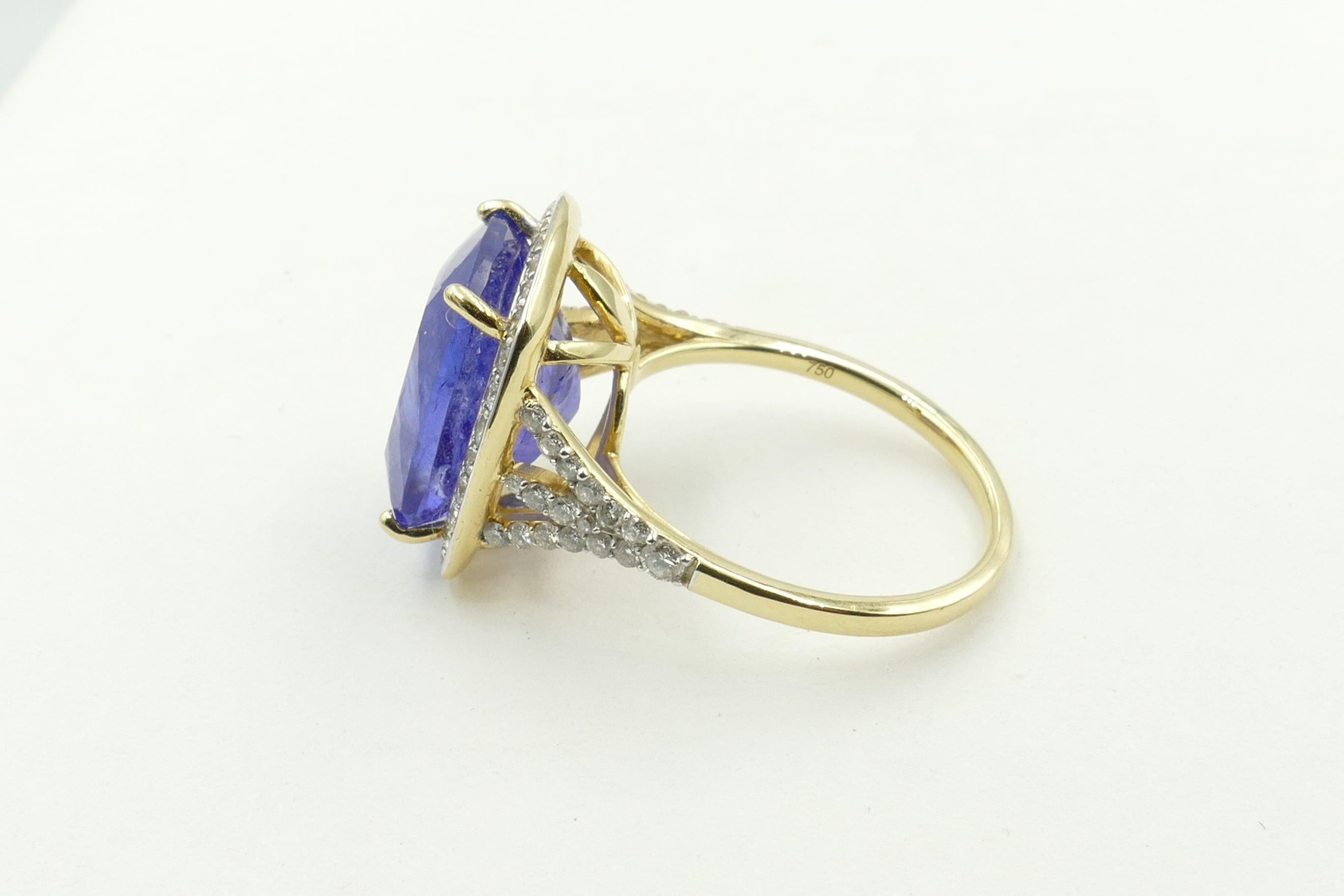 Mixed Cut 18 Carat Yellow Gold Large Tanzanite and 65 Diamond Dress Ring For Sale