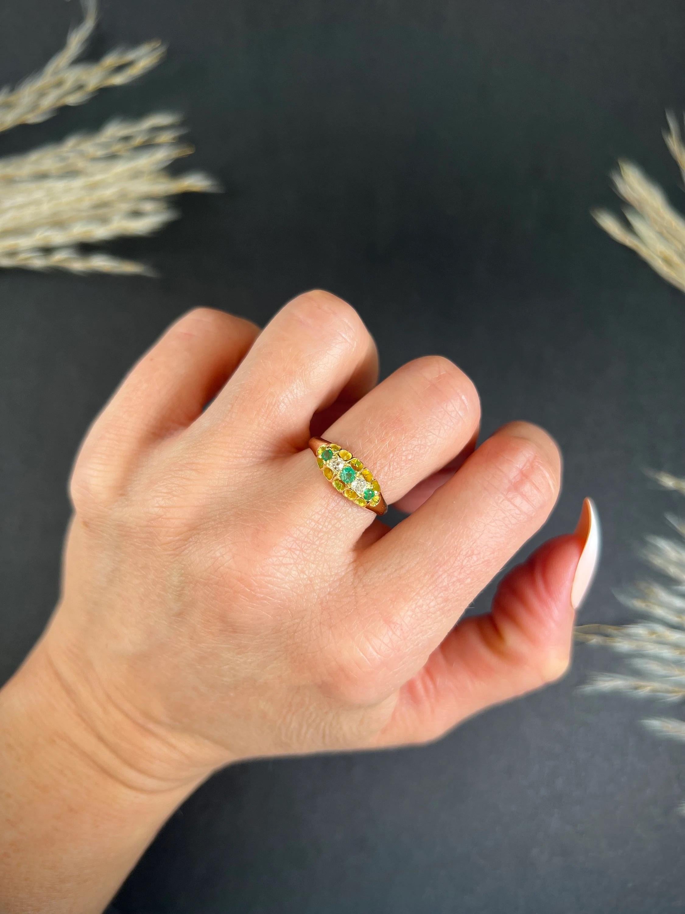 Antique Emerald & Diamond Ring

18ct Gold Stamped 

Hallmarked London 1909

This exquisite gypsy ring is made of 18ct yellow gold. It features a stunning emerald at the centre, flanked by two natural diamonds on either side and a further two