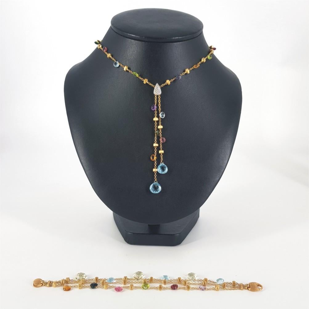 A Beautifully crafted Marco Bicego Set, comprising a necklace and bracelet.
This very colourful necklace & bracelet set - using multi coloured semi-precious gem stones & White Diamonds, are both set in 18K yellow gold.

Necklace Details: 	15 Semi