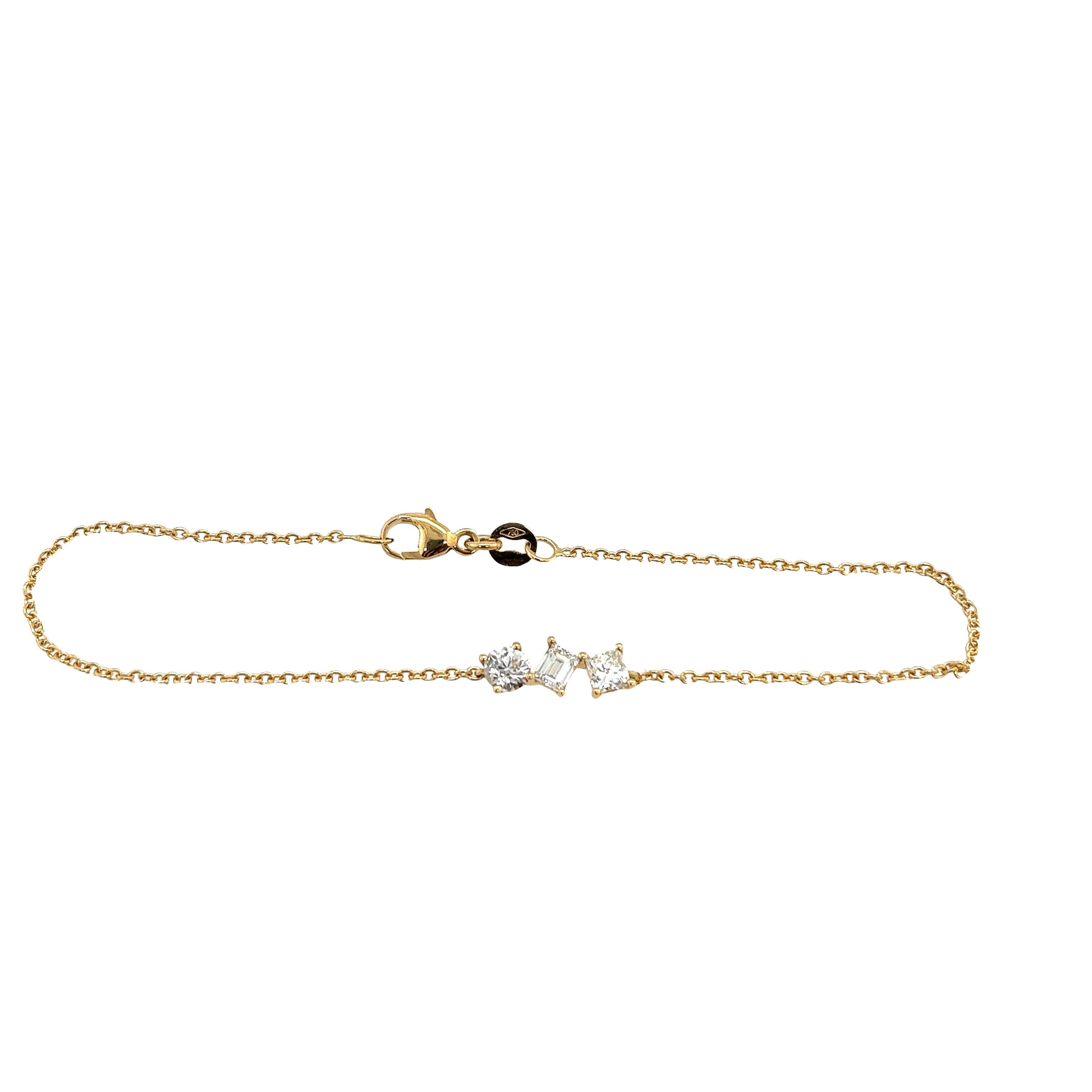 Add a touch of glamour to any occasion with this beautiful bracelet. 
The bracelet features three stunning diamonds, each with a unique shape, and a total carat weight of 0.75ct.
The lobster closure ensures that the bracelet stays securely in place,