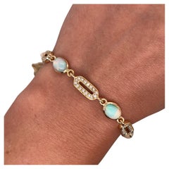 Pulsera de oro amarillo de 18 ct con diamantes naturales y ópalo