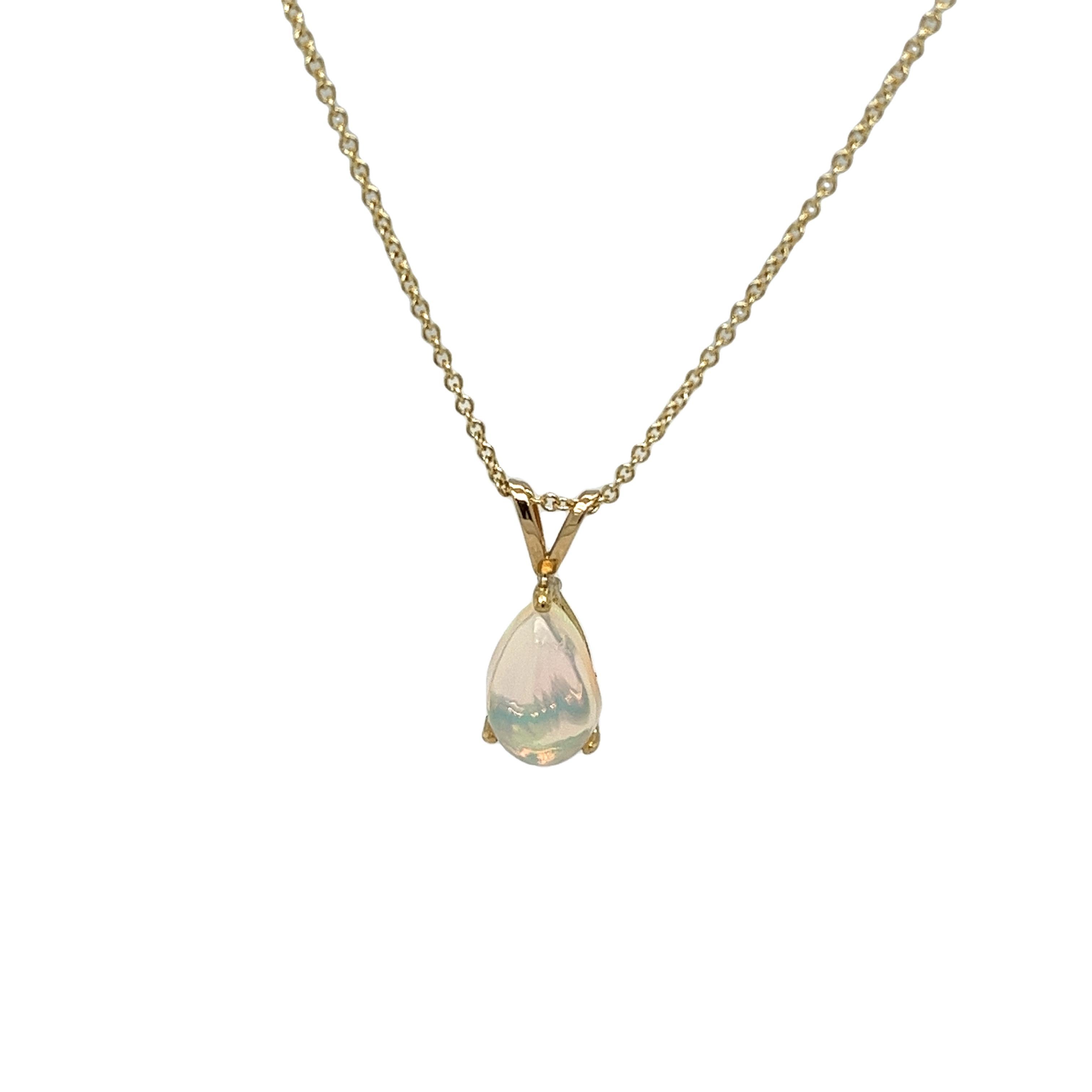 This gorgeous 18ct yellow gold pear shape opal pendant 
is set in a unique shape, making it a very elegant and beautiful piece of jewellery, suspended from 16
