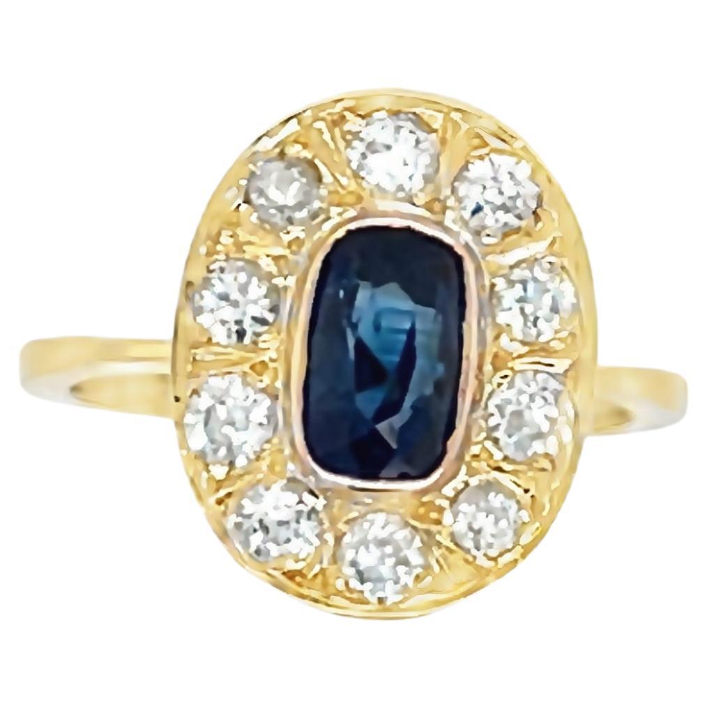 18ct Yellow Gold Ring Set with Sapphire with 10 round diamonds