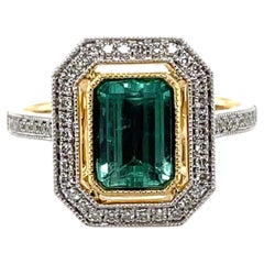 18 Karat Gelbgold Ring mit 1,40 Karat kolumbianischem Smaragd und Diamant