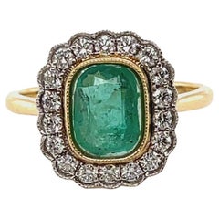 elongated emerald cut diamond 18ct Yellow Gold Ring with 1.40ct Emerald and Diamond