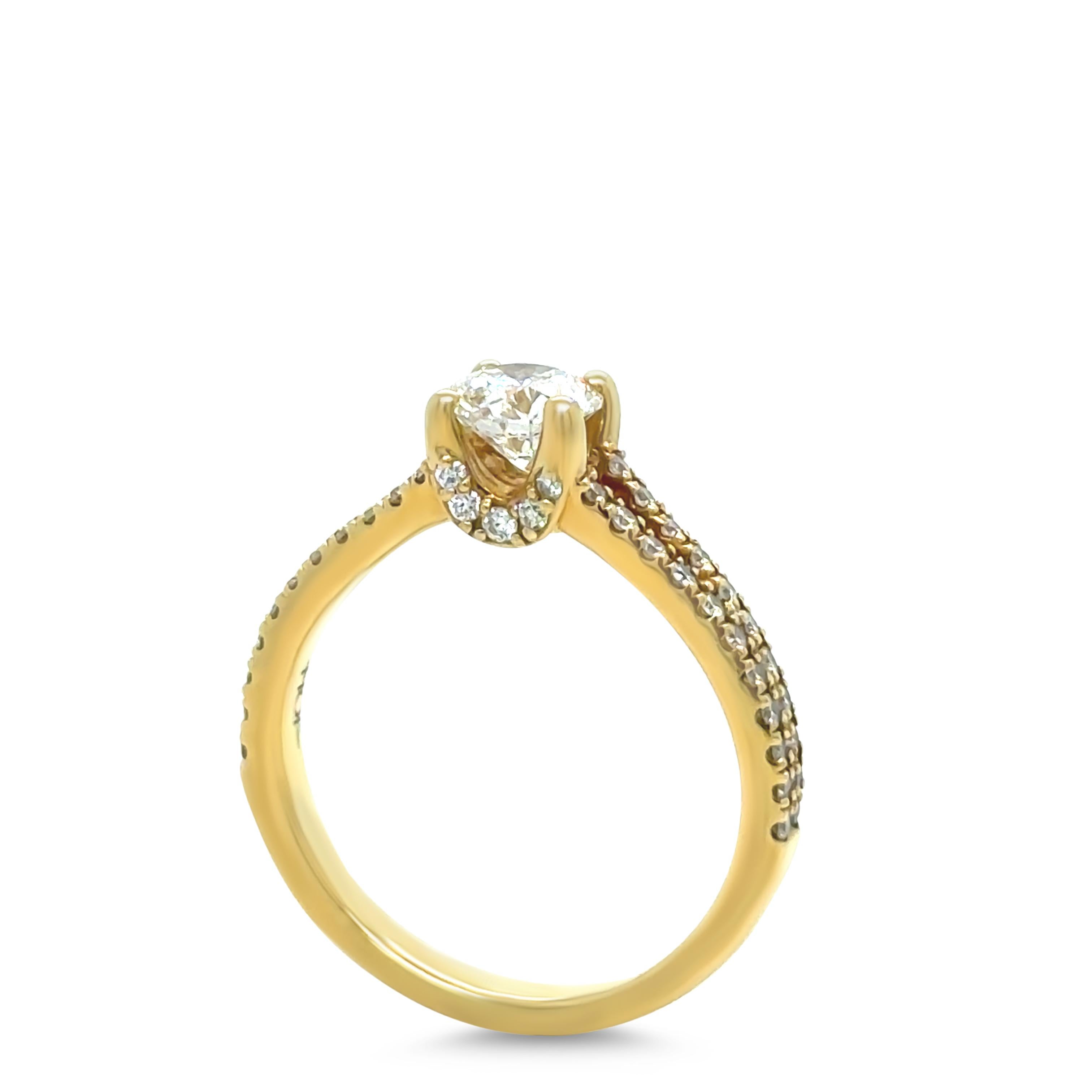 Bague en or jaune 18ct avec diamant rond taillé en brillant 0.87ct en vente 3