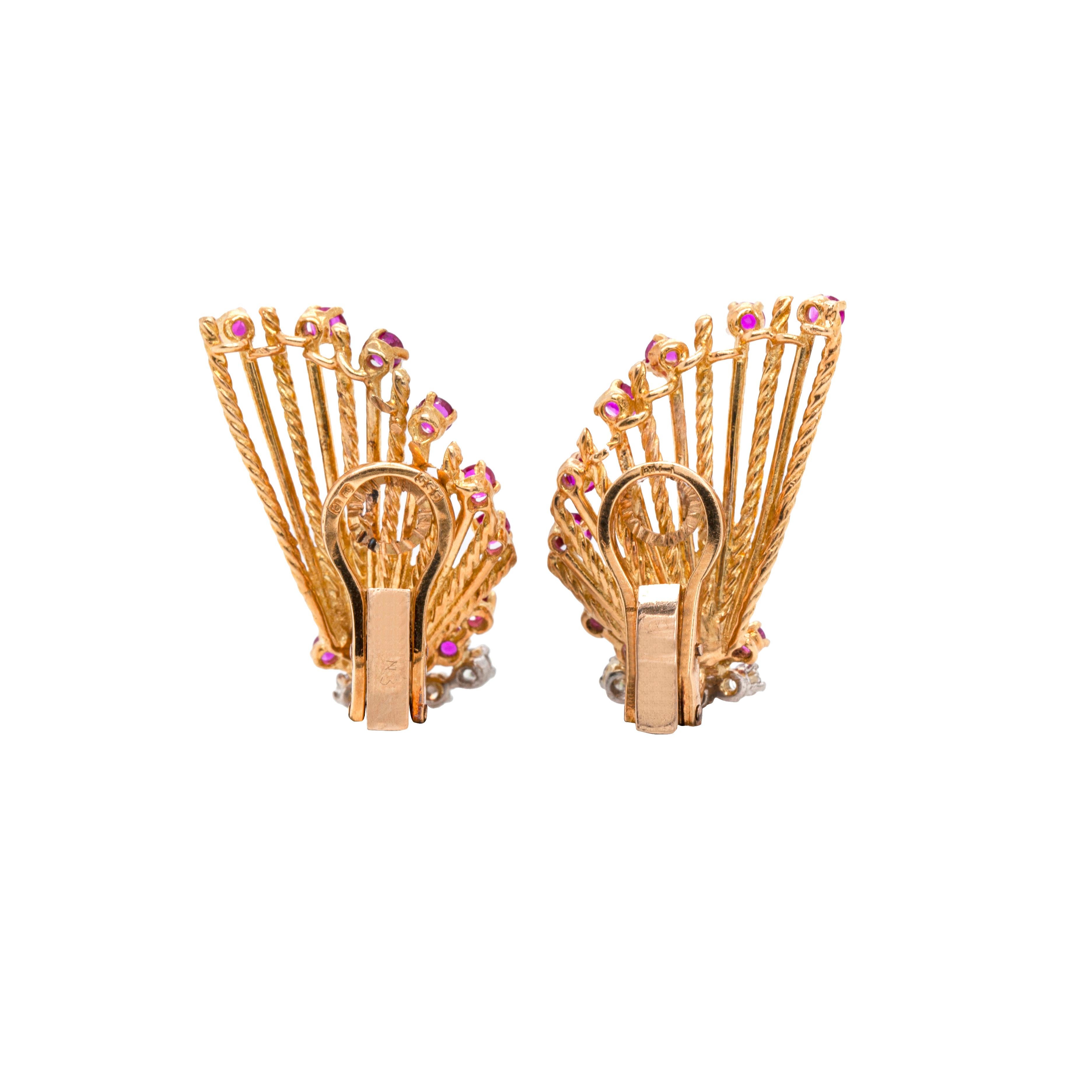 These stunning earrings are any Kutchinsky fan's must-have piece. And even if you're not, their vintage elegance is magnetic. 

We date these sumptuous fan-style earrings to the late 1960s or early 1970s. Set with an estimated 0.40 carats of