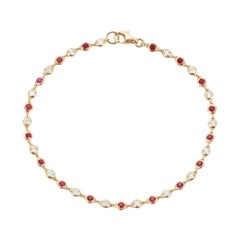 Bracelet en or jaune 18ct avec chaîne en rubis et diamants