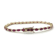 18 Carat Yellow Gold Ruby and Diamond Line Bracelet