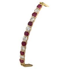 Armband aus 18 Karat Gelbgold mit Rubin und Diamanten, gefasst mit 1,50 Karat Diamanten und 1,75 Karat Rubin