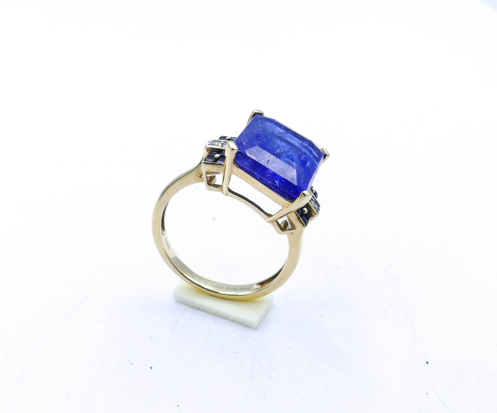 This is a Really different Tanzanite Ring. 
Styled on the Square set style of the ART DECO Period this beautifully crafted Ring looks gorgeous on the hand.

Stunningly large Stone of 10.5 Carats and colour more towards the Blue spectrum more than