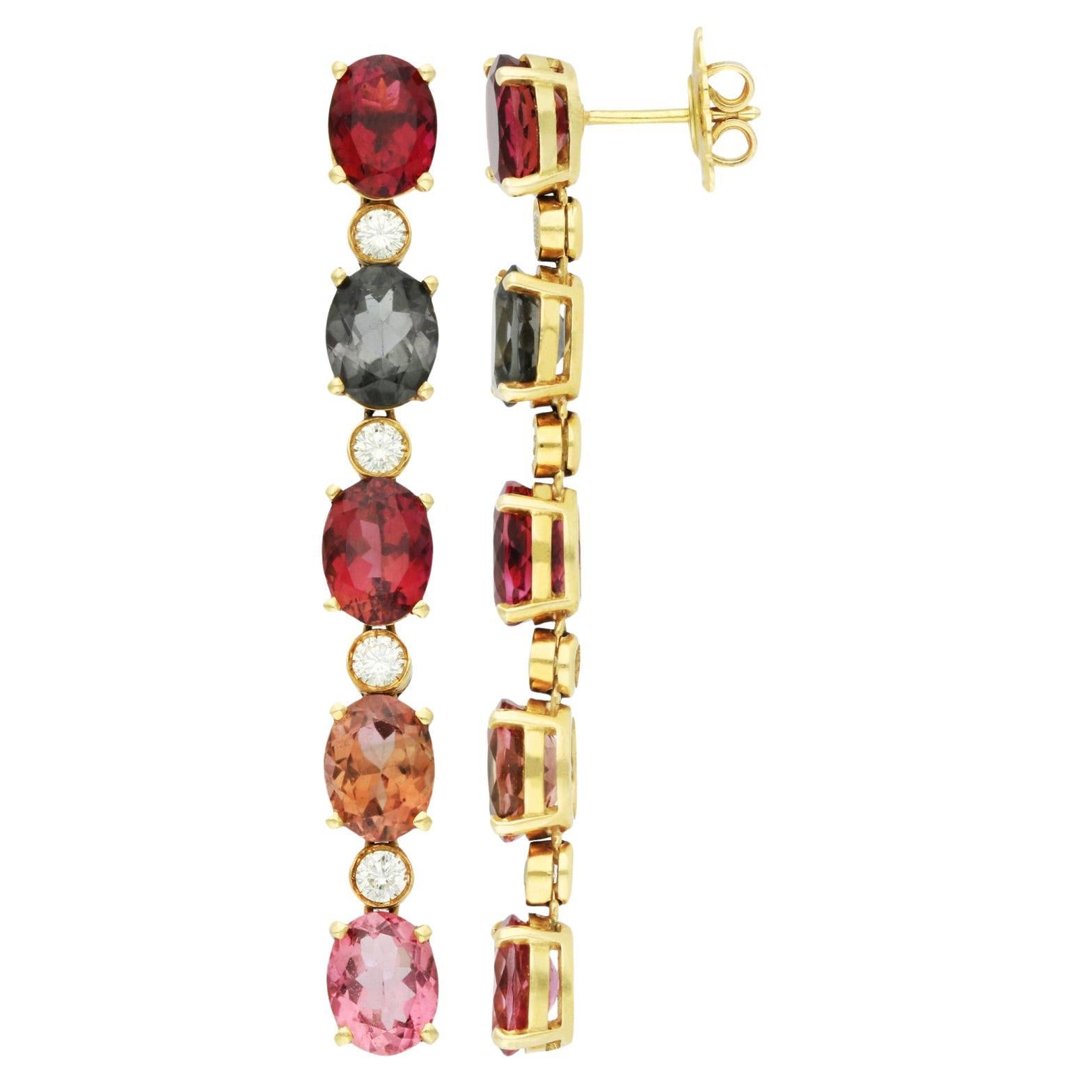 18ct Yellow Gold 18ct Tourmaline & 0.80ct Diamond Drop Earrings

Elevate your elegance with our Pair of Pre-Loved 18ct Yellow Gold Tourmaline & Diamond Drop Earrings, a mesmerising cascade of vibrant colours and scintillating diamonds. Each earring