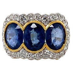 18 Karat Gelbgold Trilogie Blauer Saphir und Diamant Ring