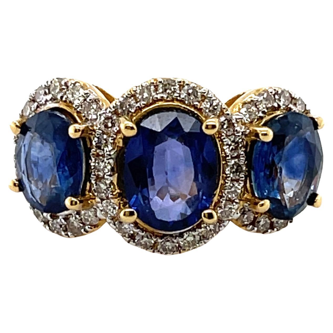 For Sale:  18ct Yellow Gold Trilogy Sapphire and Diamond Ring