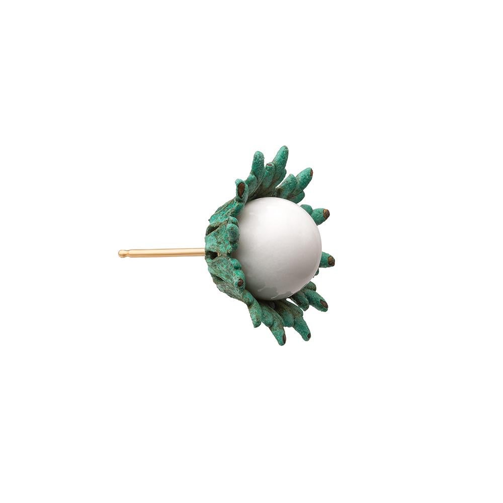 18ct yellow gold vermeil, white agate and verdigris brass earrings

These 'First Bud' Earrings draw their inspiration from the new growth shoots found sprouting from box hedges at every direction at the turn of spring. The round bead at the centre