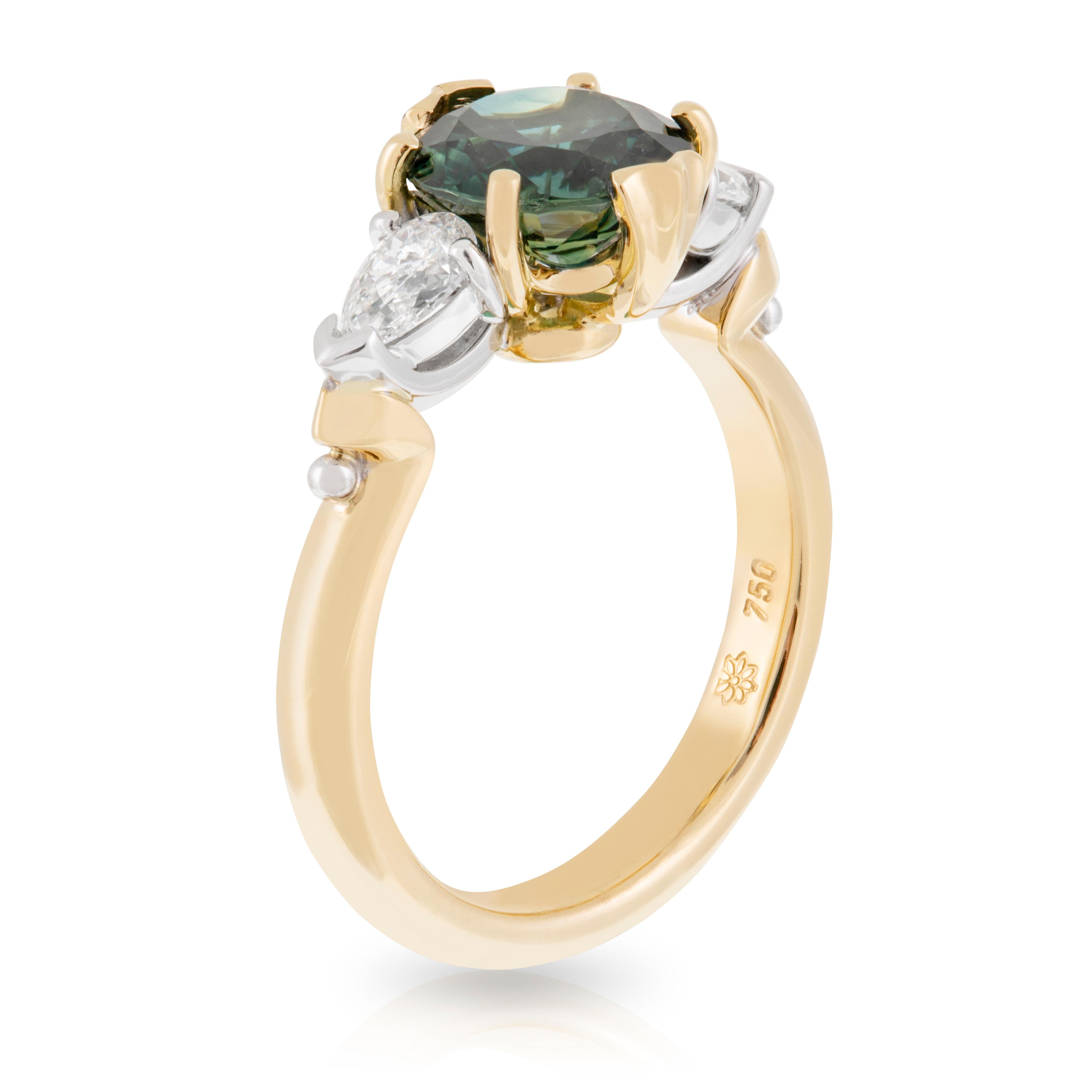 18ct Yellow and White Gold Round Brilliant Cut 2.14ct Australian Green/Blue Parti Sapphire with Pear Shaped Diamond Shoulder Trilogy Ring. TDW 0.41ct.