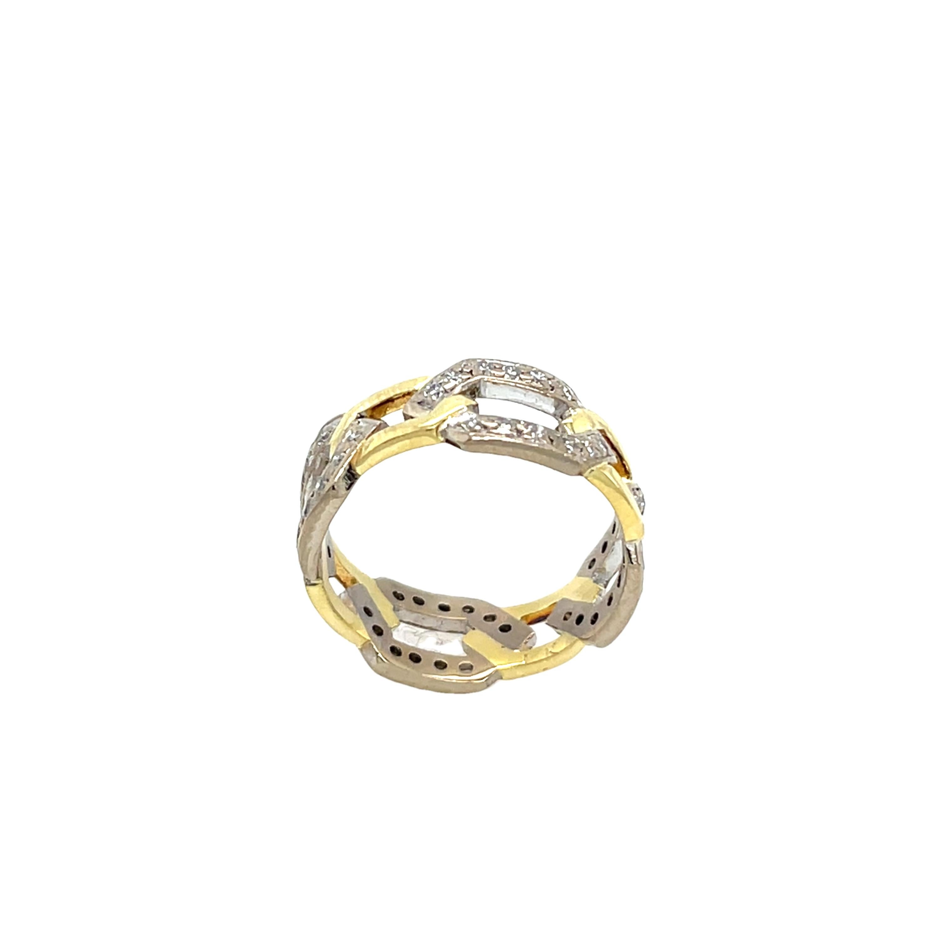 This elegant ring features a unique chain design in 18ct yellow and white gold, 
adorned with 0.30ct of natural round brilliant cut diamonds. 
A modern and sophisticated accessory.

Width of Band: 7.33mm
Total Weight: 4.64g
Ring Size: L
Diamond