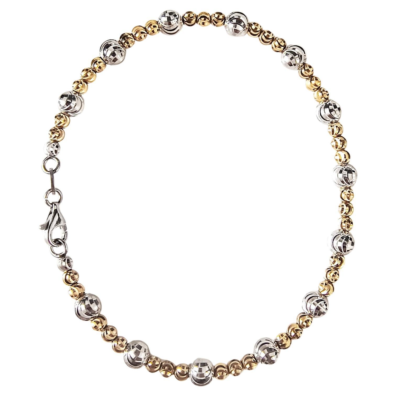 Bracelet vintage en or jaune et blanc 18ct avec perles en forme de diamant