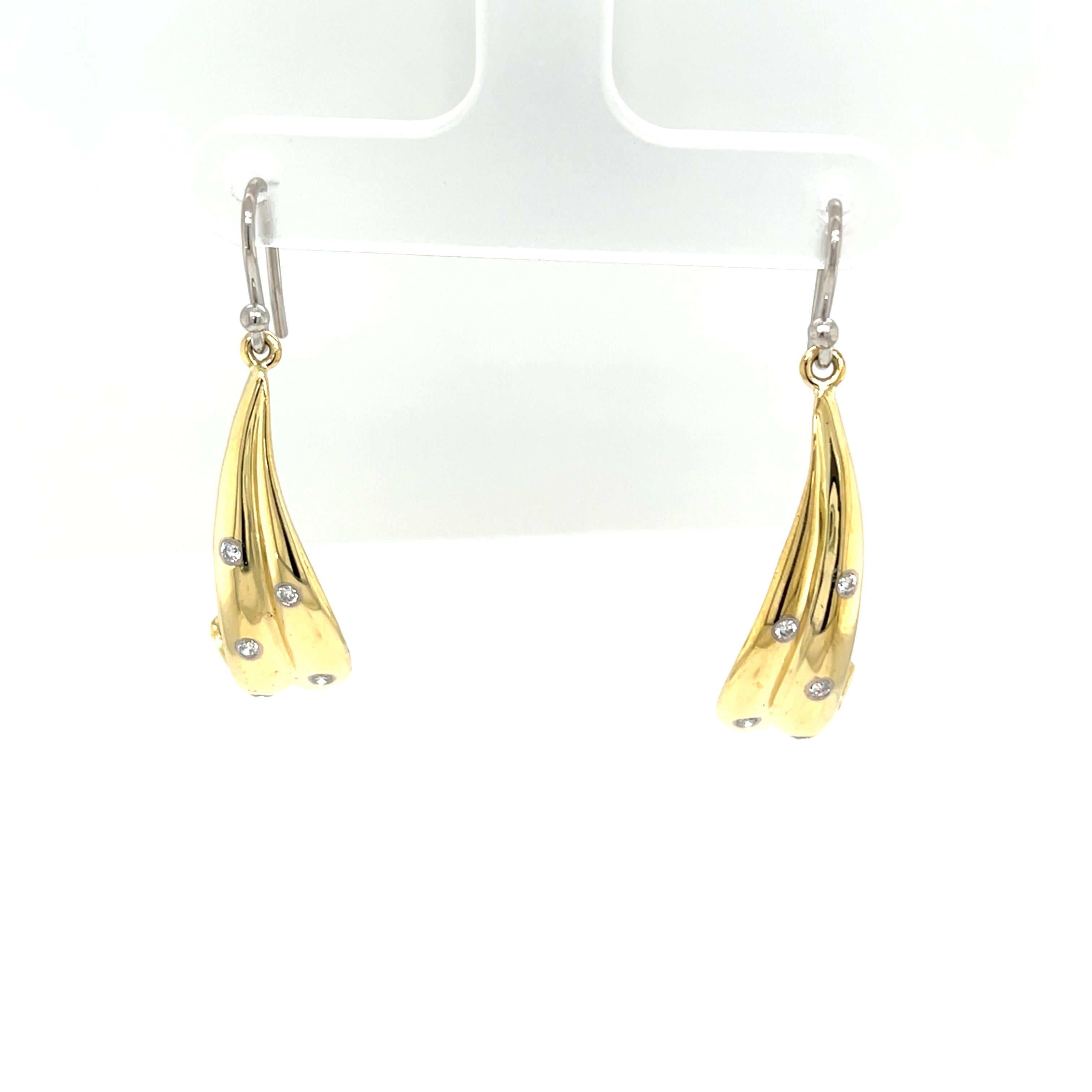 Boucles d'oreilles en or jaune et blanc 18 carats, diamants naturels de 0,25 carat Excellent état - En vente à London, GB