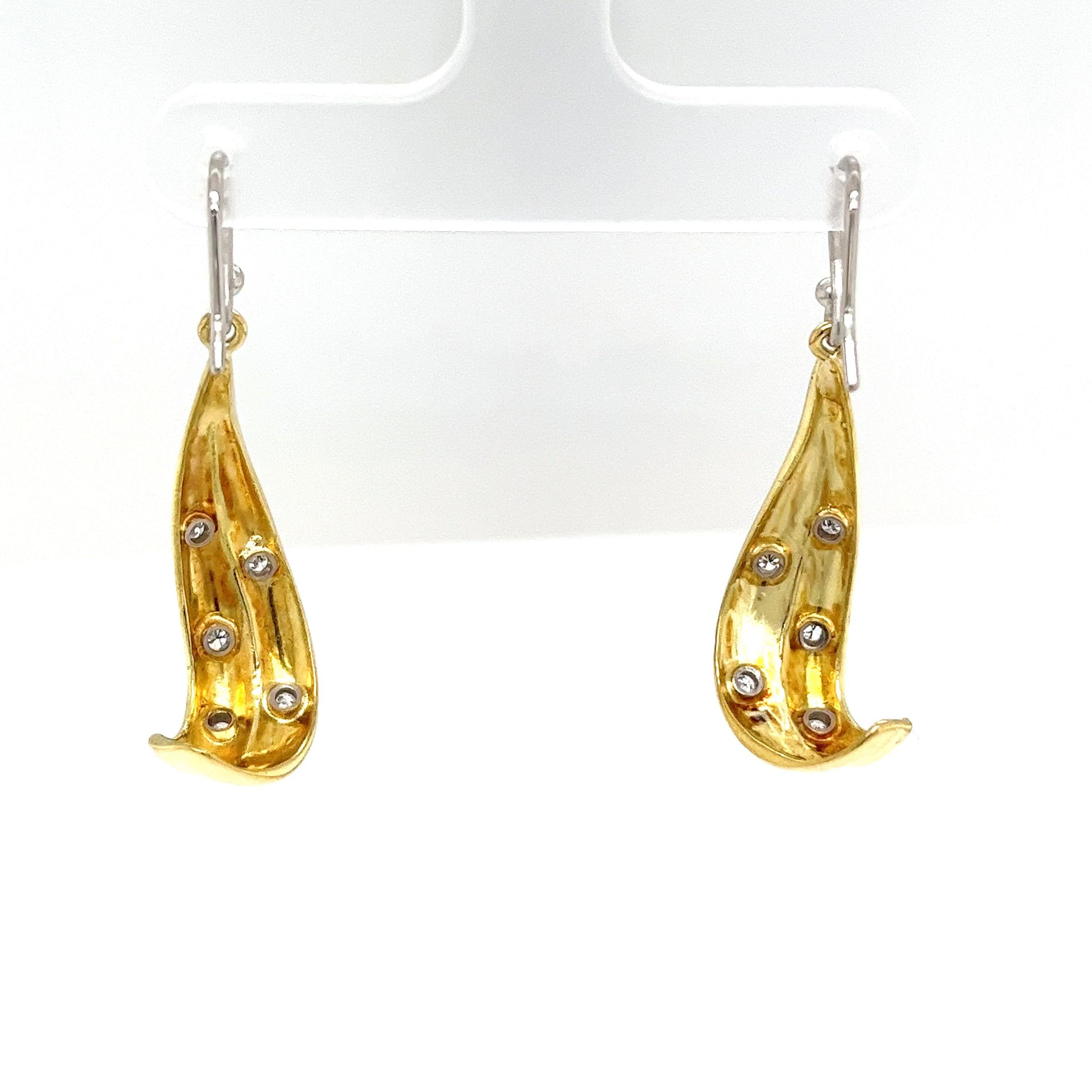 Boucles d'oreilles en or jaune et blanc 18 carats, diamants naturels de 0,25 carat en vente 1