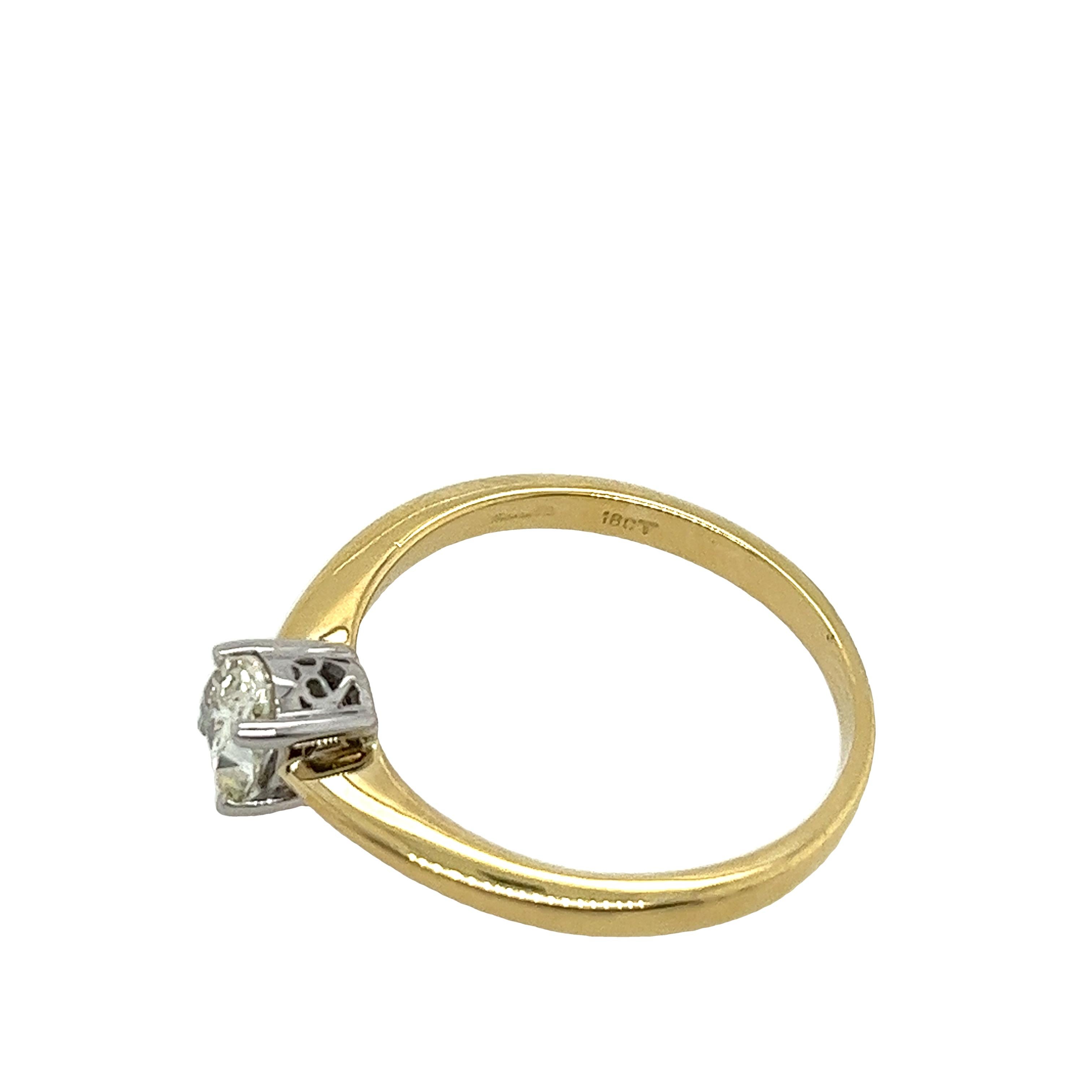 18ct Yellow & White Gold Diamond Solitaire Ring Set With 0.57ct Oval Shape 1