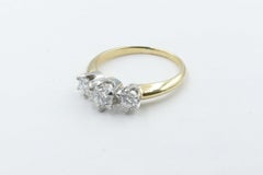 18 Carat Yellow and White Gold High Level, E/F Diamond Trilogy Ring