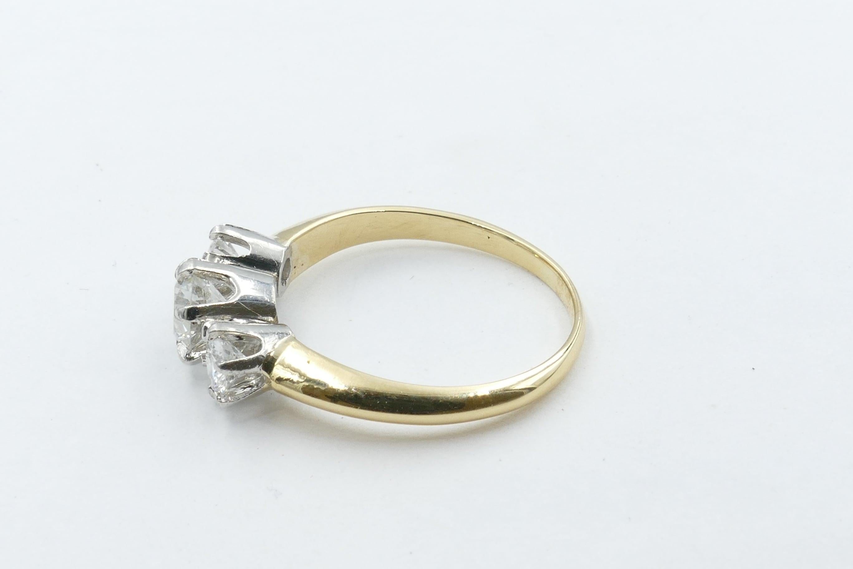 Modern 18 Carat Yellow and White Gold High Level, E/F Diamond Trilogy Ring For Sale