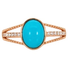 1.8cts Arizona Sleeping Beauty Turquoise Ring with Diamonds in 14K Gold, 9x7mm