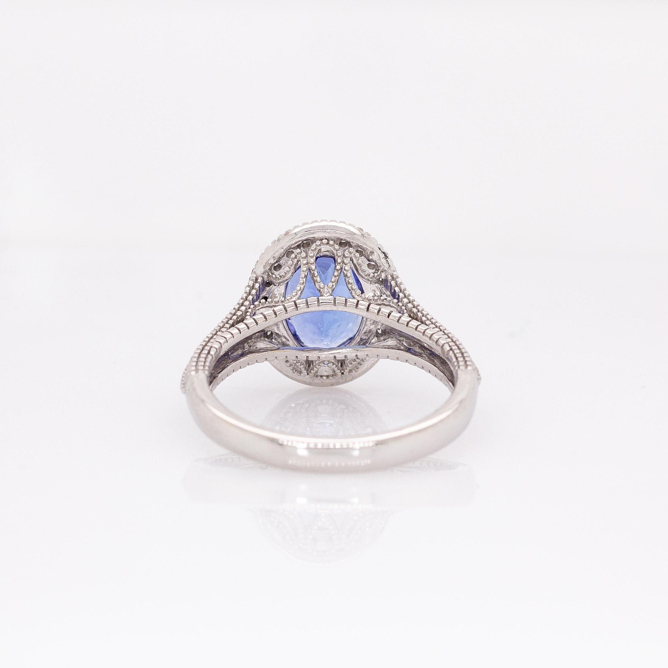 Donna Anello con tanzanite da 1,8 carati e diamanti naturali: oro massiccio 14k, ovale 9x7mm in vendita