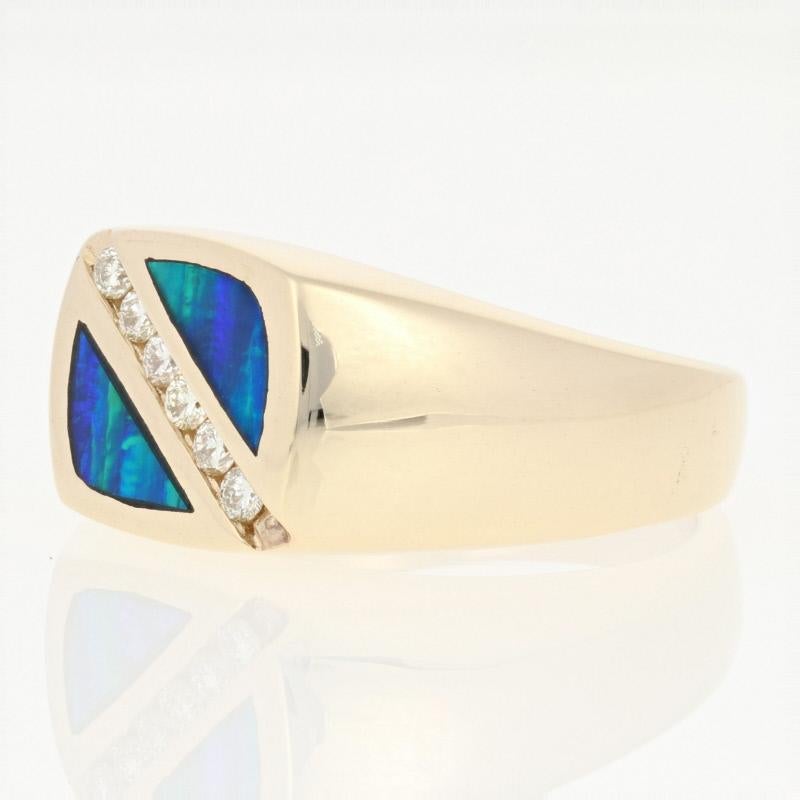 This ring is a size 10 1/2 - 10 3/4.

Metal Content: Guaranteed 14k Gold as stamped

Stone Information: 
Natural Diamonds  
Clarity: SI2 - I1
Color: H - I  
Cut: Round Brilliant 
Total Carats: 0.18ctw

Genuine Opal Inlay

Face Height (north to