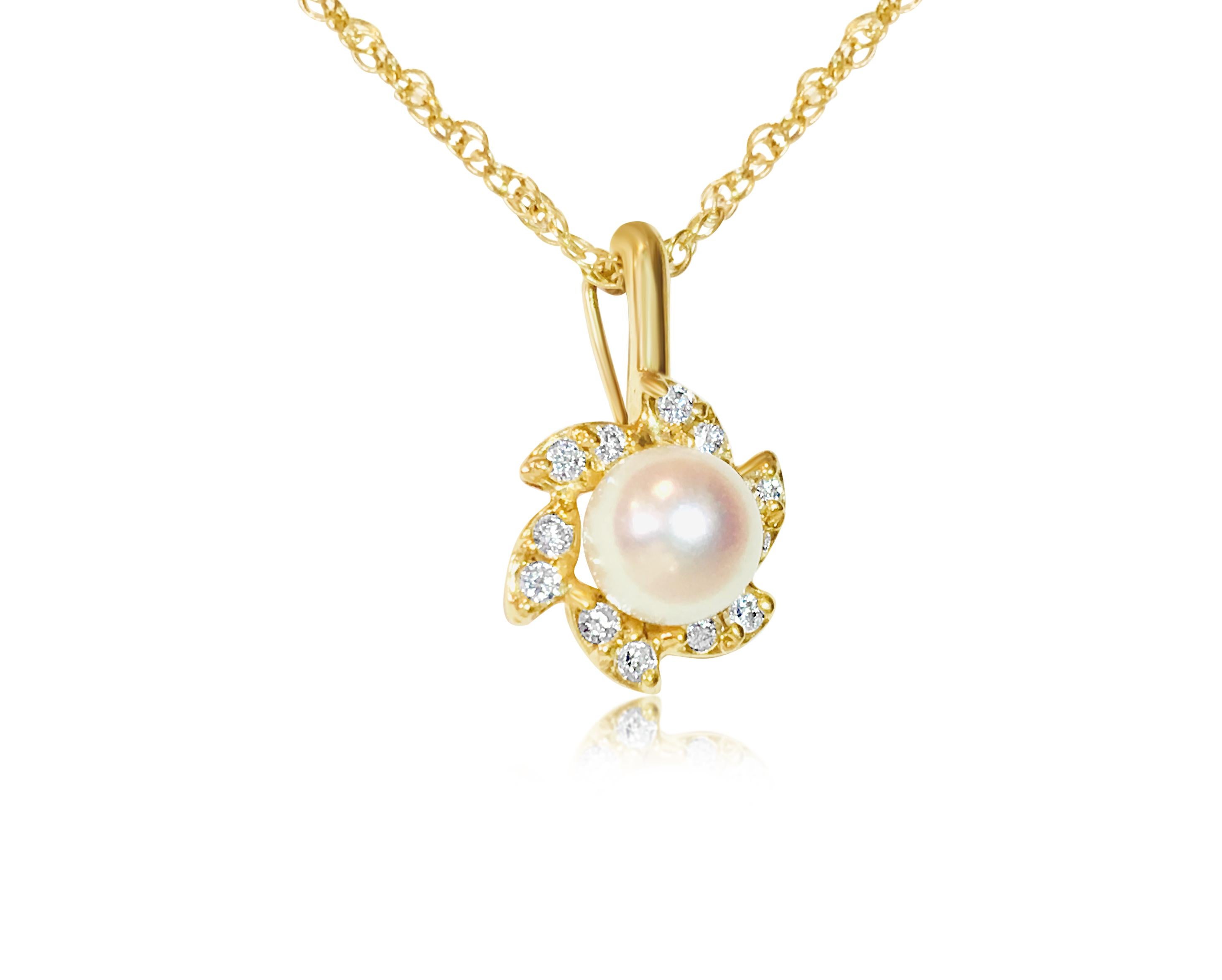 Brilliant Cut 18K, 0.65 CT diamond & pearl; earrings & pendant set For Sale