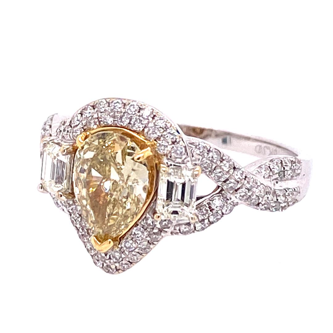 A 1.00 Carat GIA certified Fancy Brown Green Yellow Pear Shape Diamond and White Diamond Bridal in 18K Two-Tone Gold.  GIA Certificate Number 2195593723, available upon request.  Round Brilliant Cut and Baguette Cut Diamonds 1.03 carat total weight,