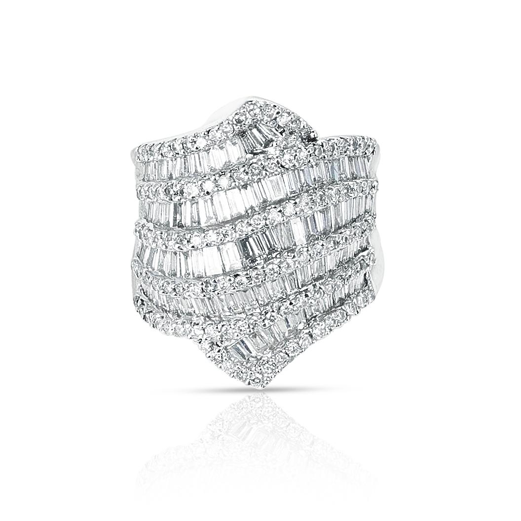 A 18K 1.35 ct. Five Row Diamond Baguettes Cocktail Ring. The ring size is 7 3/4 US. 