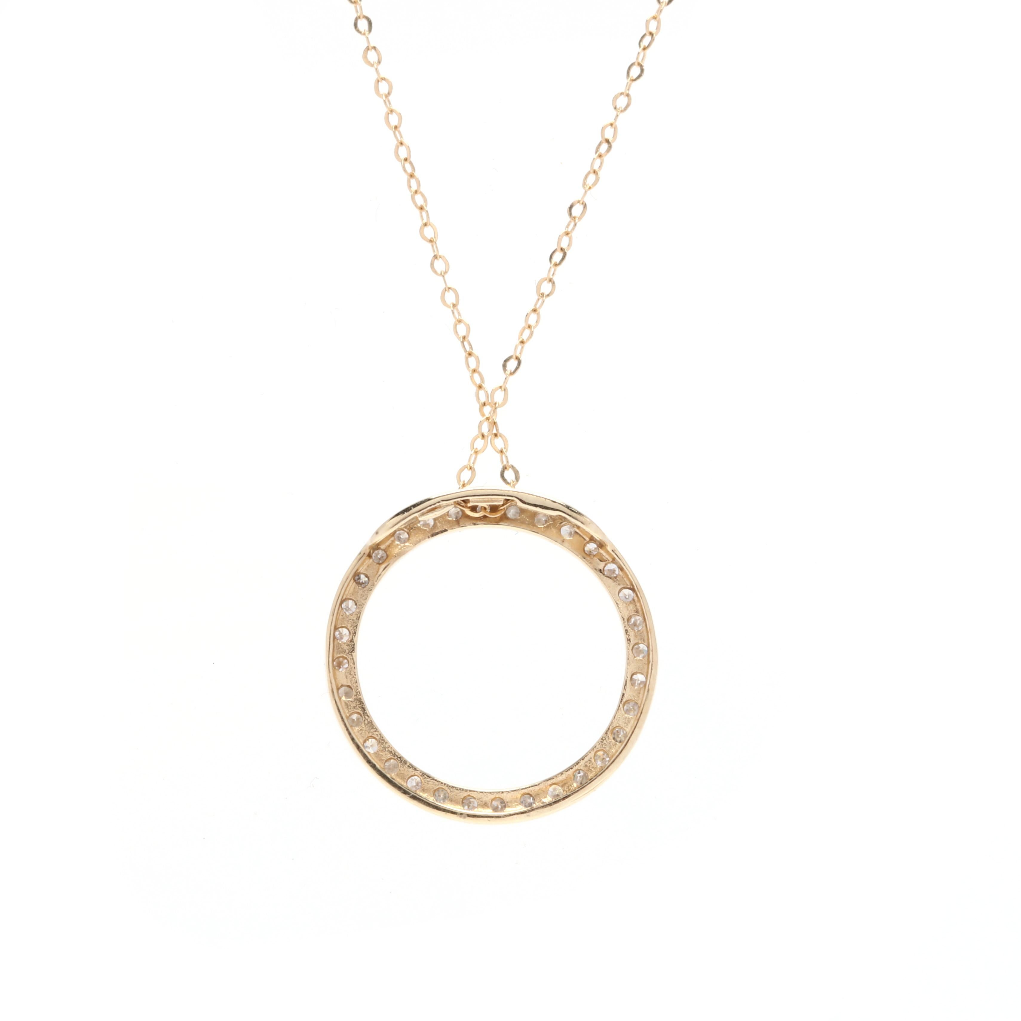 An 18 karat and 14 karat yellow gold diamond circle pendant necklace. With an open circle pendant set with single cut diamonds weighing approximately .30 total carats and suspended from a thin oval link chain. 

Stones:
- diamonds
- single cut, 32