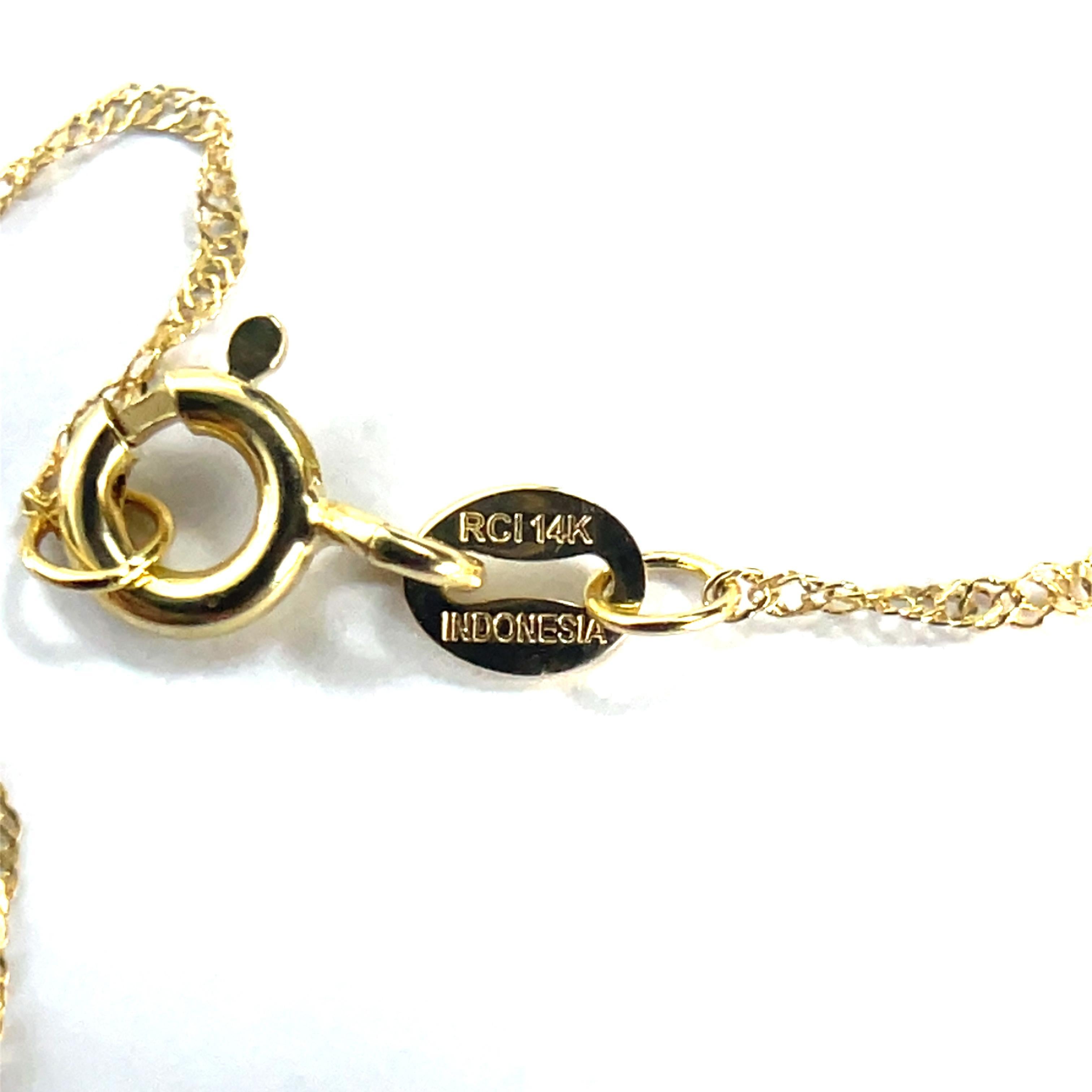 Colgante espina de pez con incrustaciones de diamantes en oro amarillo de 18k/14k en Excelente estado para la venta en New York, NY