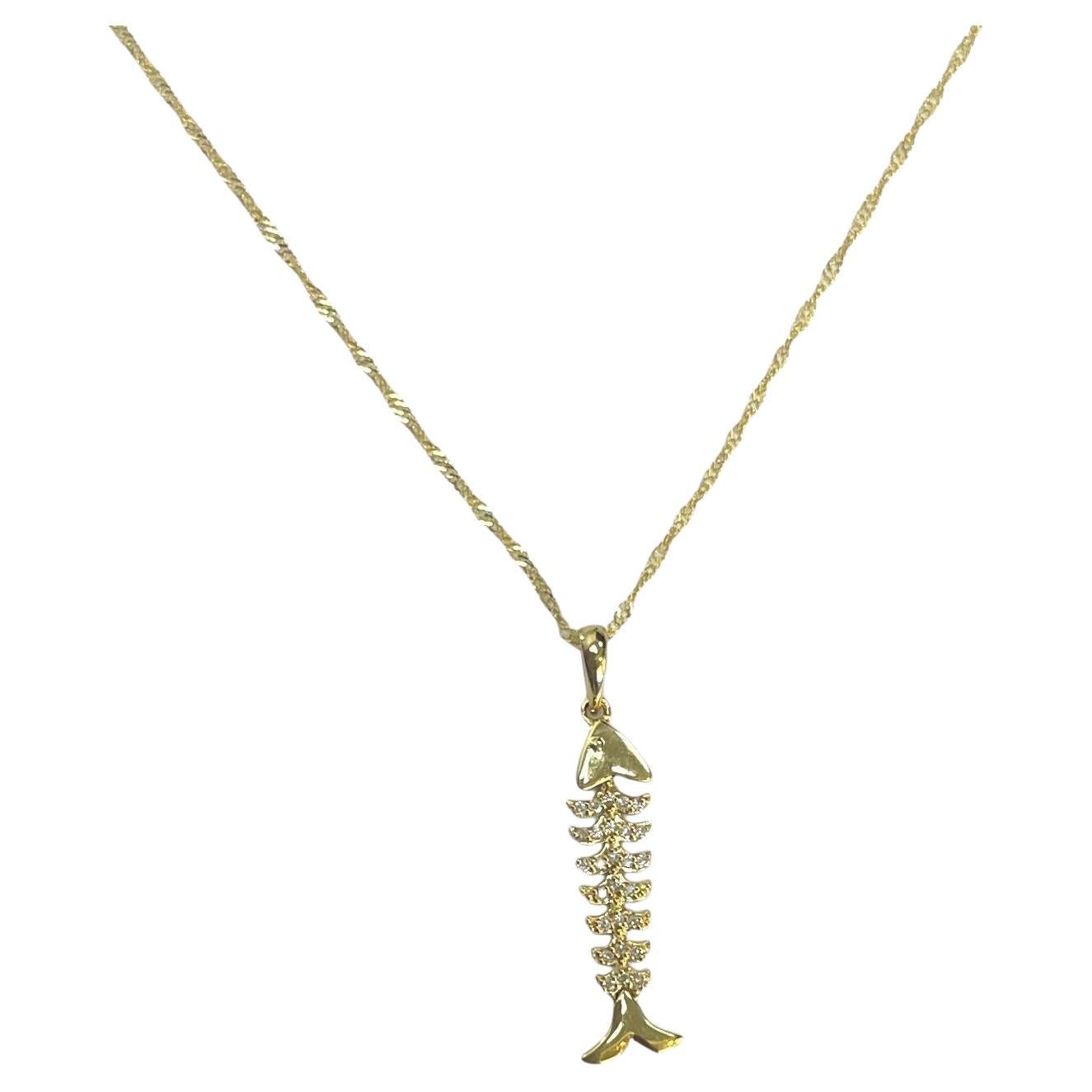 Colgante espina de pez con incrustaciones de diamantes en oro amarillo de 18k/14k en venta