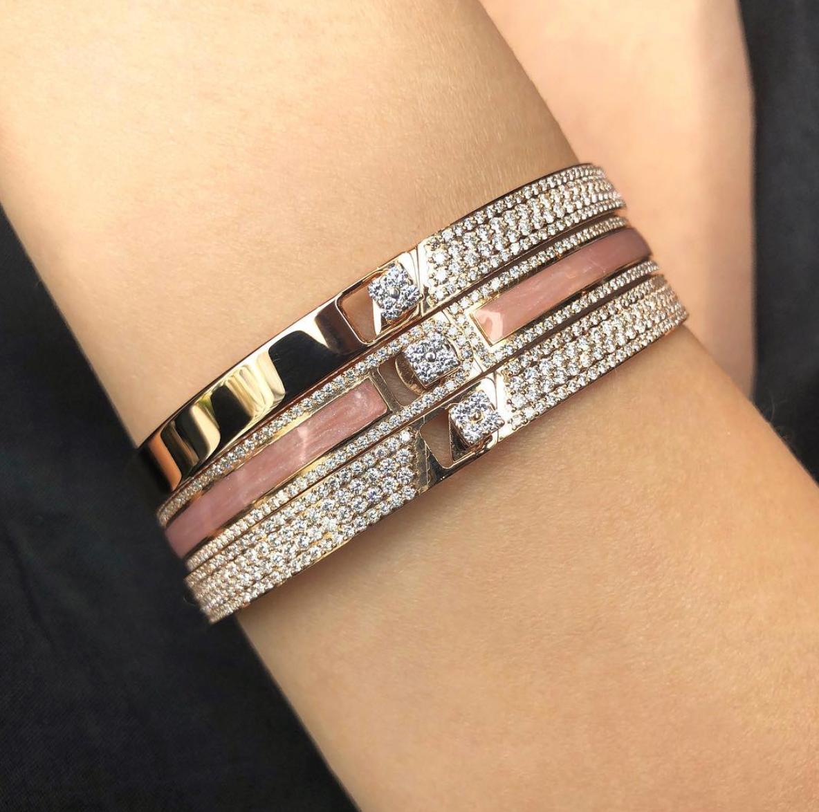 A ray of light, a band of colours, an illusion and journey on a wavelength. Iconic, bold and unique hand painted stackable designs. Add your personal touch to each design with your initials or a symbol.

Product Name: Rose Border Bracelet 
Diamonds: