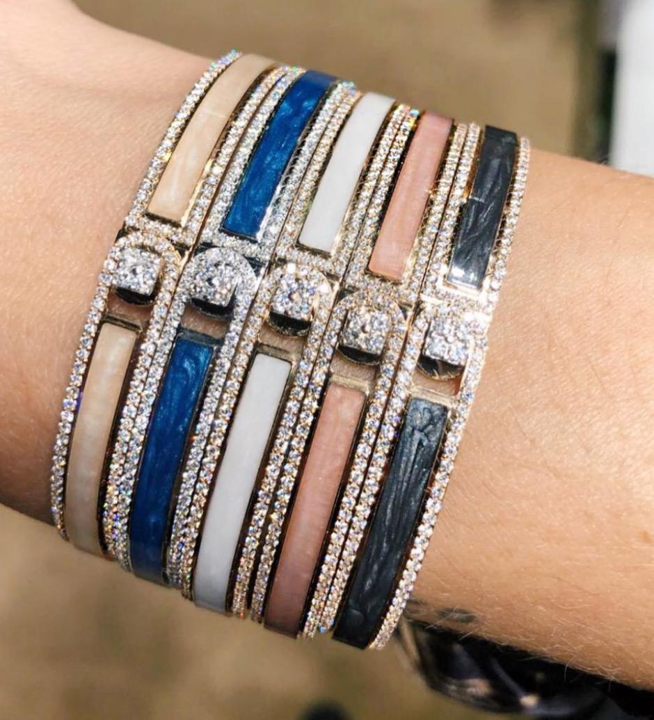 A ray of light, a band of colours, an illusion and journey on a wavelength. Iconic, bold and unique hand painted stackable designs. Add your personal touch to each design with your initials or a symbol.

Product Name: Border Bracelet 
Diamonds: