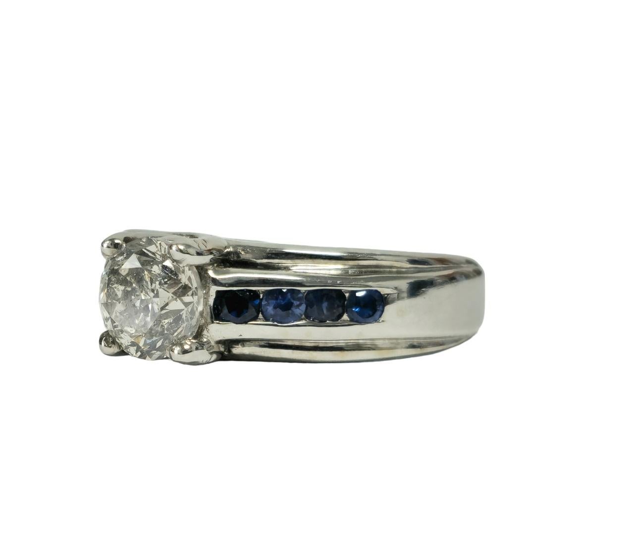 Indulge in elegance with this 18K white gold ring, boasting a total carat weight of 1.70. Featuring dazzling diamonds and captivating blue sapphires, it's perfect for birthdays, engagements, and special occasions.

Key Features:

Metal: 18K white