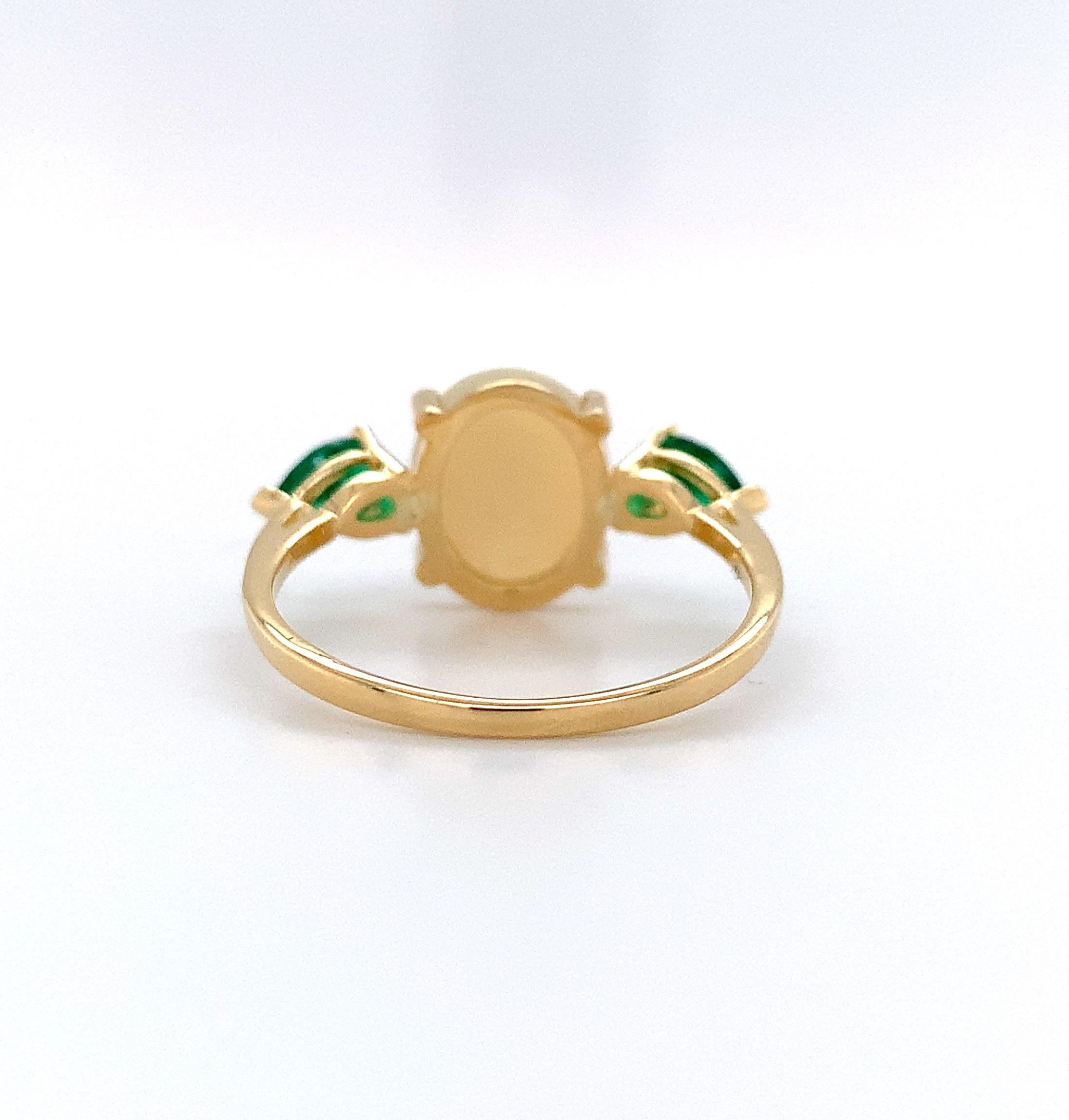 Oval Cut 18K 1.76ct Opal and Emerald Ring For Sale