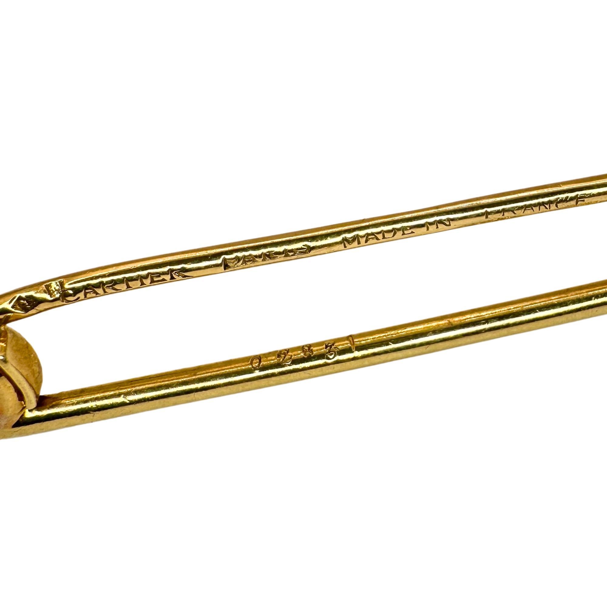 Add a Subtle touch of elegance with this 18k Cartier Paris Safety Pin Brooch. Crafted from high quality 18k yellow gold, this brooch exudes luxury and sophistication. In good condition with minor surface wear, this vintage piece is a must-have for