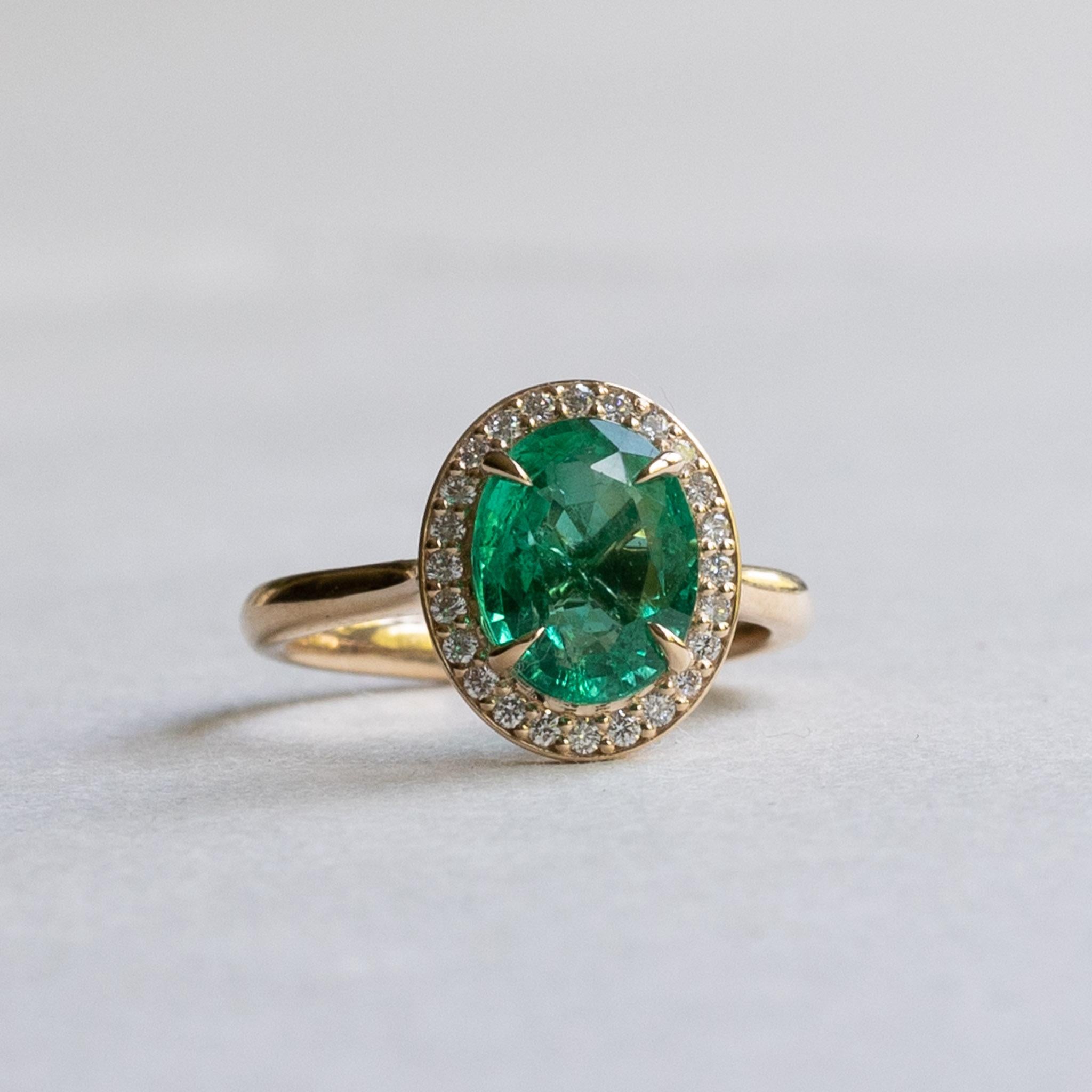 Oval emerald with diamonds halo ring

Metal: 18k yellow gold
Stone: Natural Emerald
Stone: 10mm x 8mm
Stone Weight: 2.5 carat
Accent Stone: Natural Diamond
Stone size: 1.2mm
Diamond Color and Clarity: G+, VS
Diamond Weight: 0.19carat total