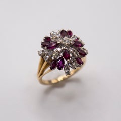 18k 2.50 carats ruby and 0.92 carats diamond pinwheel cluster. Florida estate.