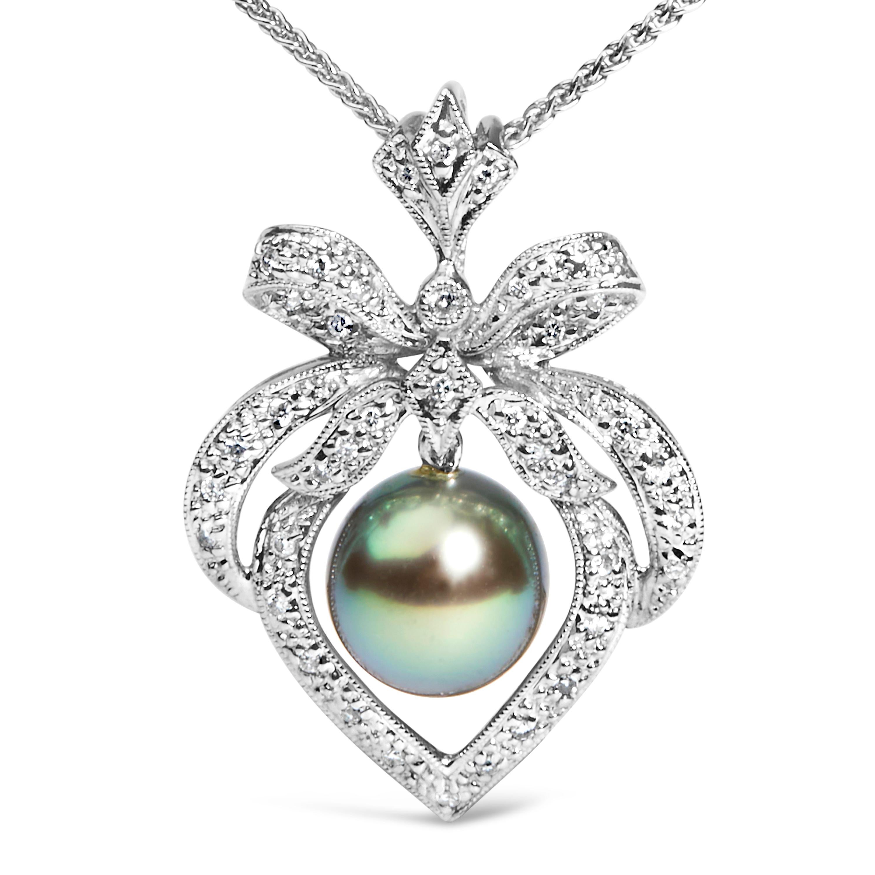 Lasciati conquistare dall'eleganza senza tempo di questa squisita collana con ciondolo, in cui lo splendore dell'oro bianco 18 carati, impreziosito da una finitura rodiata, converge con il misticismo di una gemma d'alto mare. Centrata da una