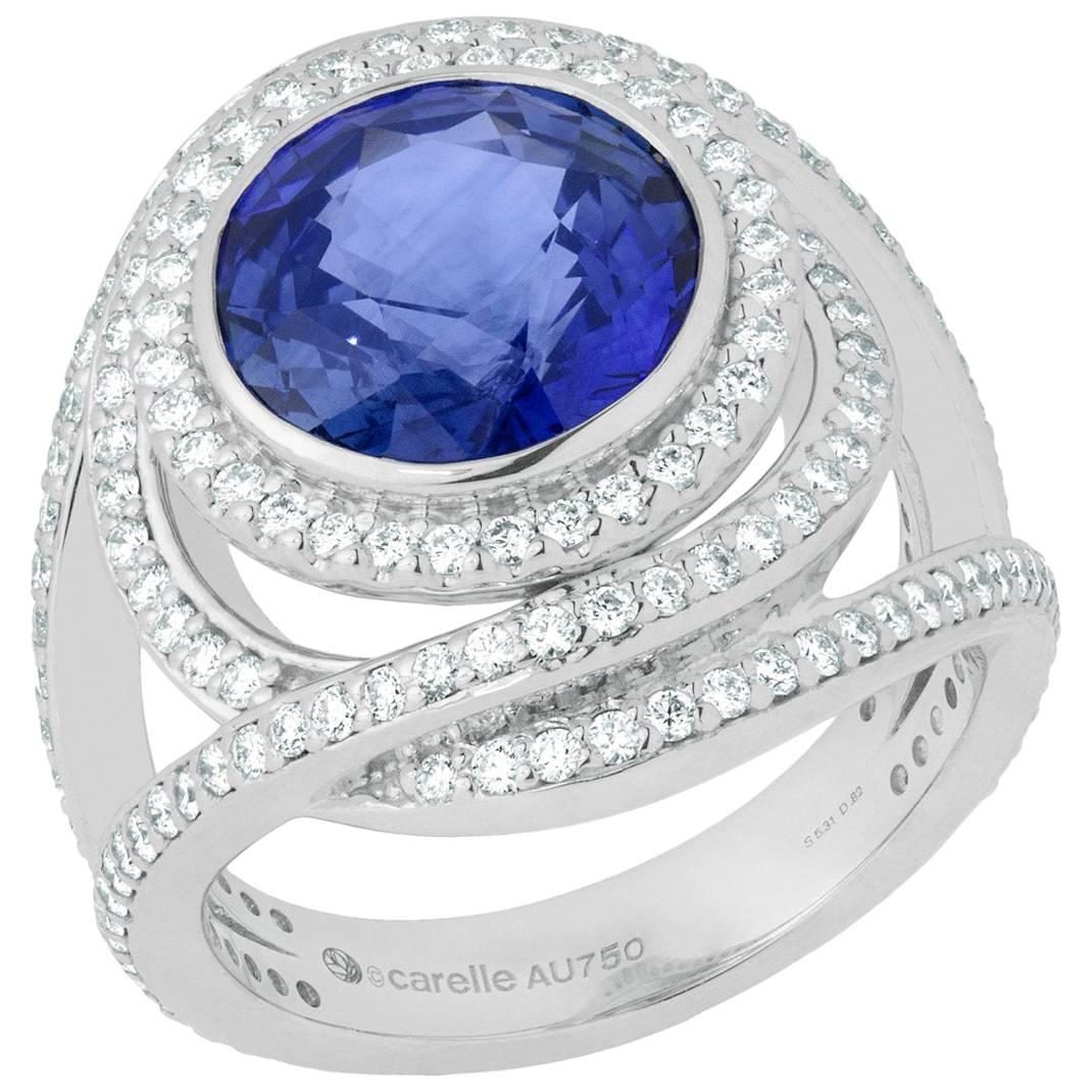 18K 5.31 Ct Ceylon Sapphire, .82 Ct Diamond Swirl Halo Cocktail Engagement Ring For Sale