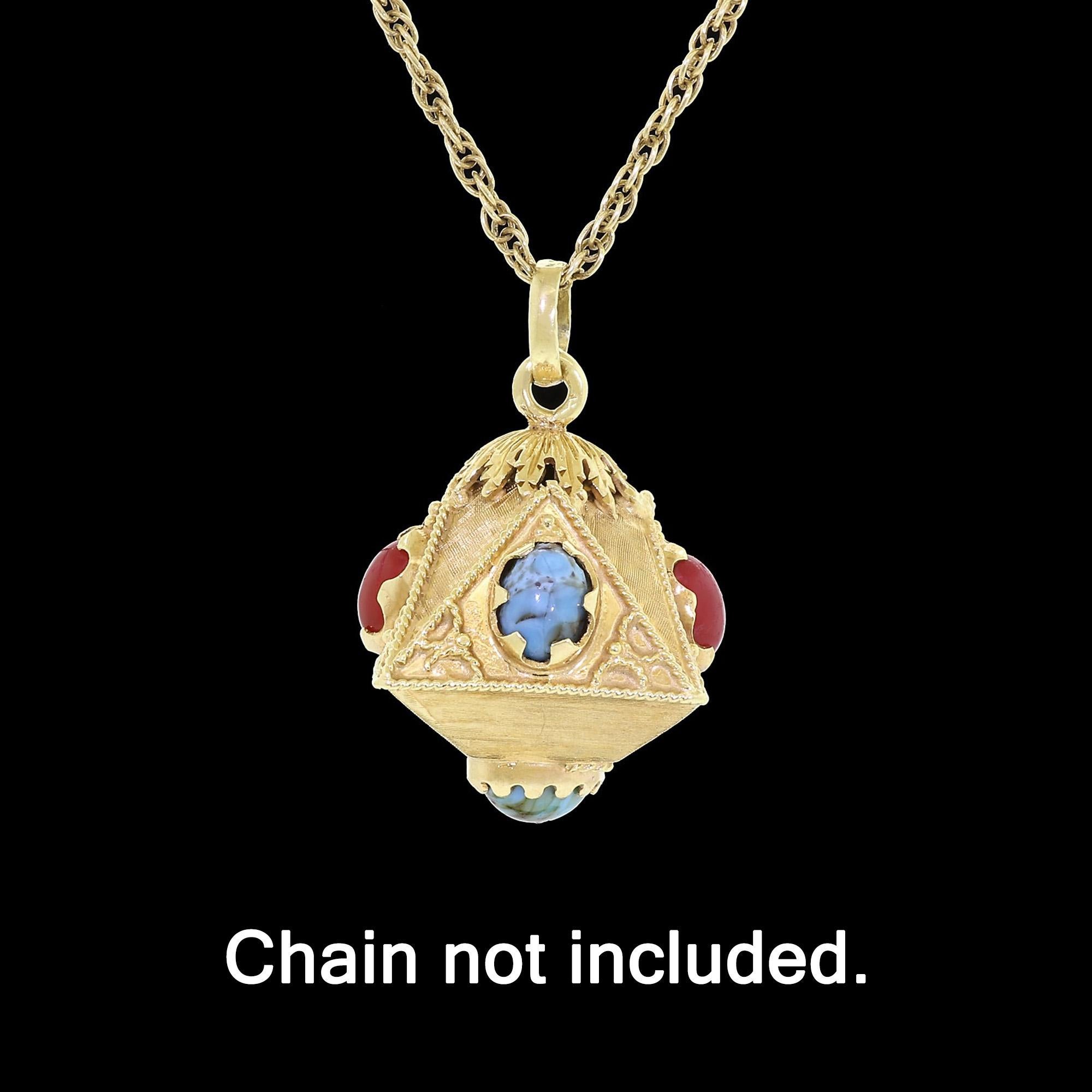 This beautiful Italian 18K yellow gold accent charm merges functional versatility with a remarkable Etruscan-style design. The striking aesthetic is created by coupling intricate gold rope and etch work with red and turquoise colored art glass